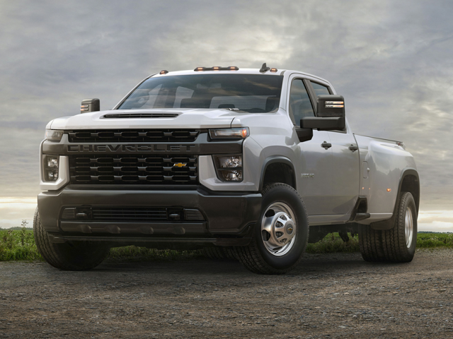 s 2020 white chevrolet silverado 3500 hd parked on a dirt and gravel road